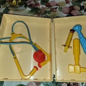 Fisher-Price Yellow and Blue Toy Doctor Set with Red Accents